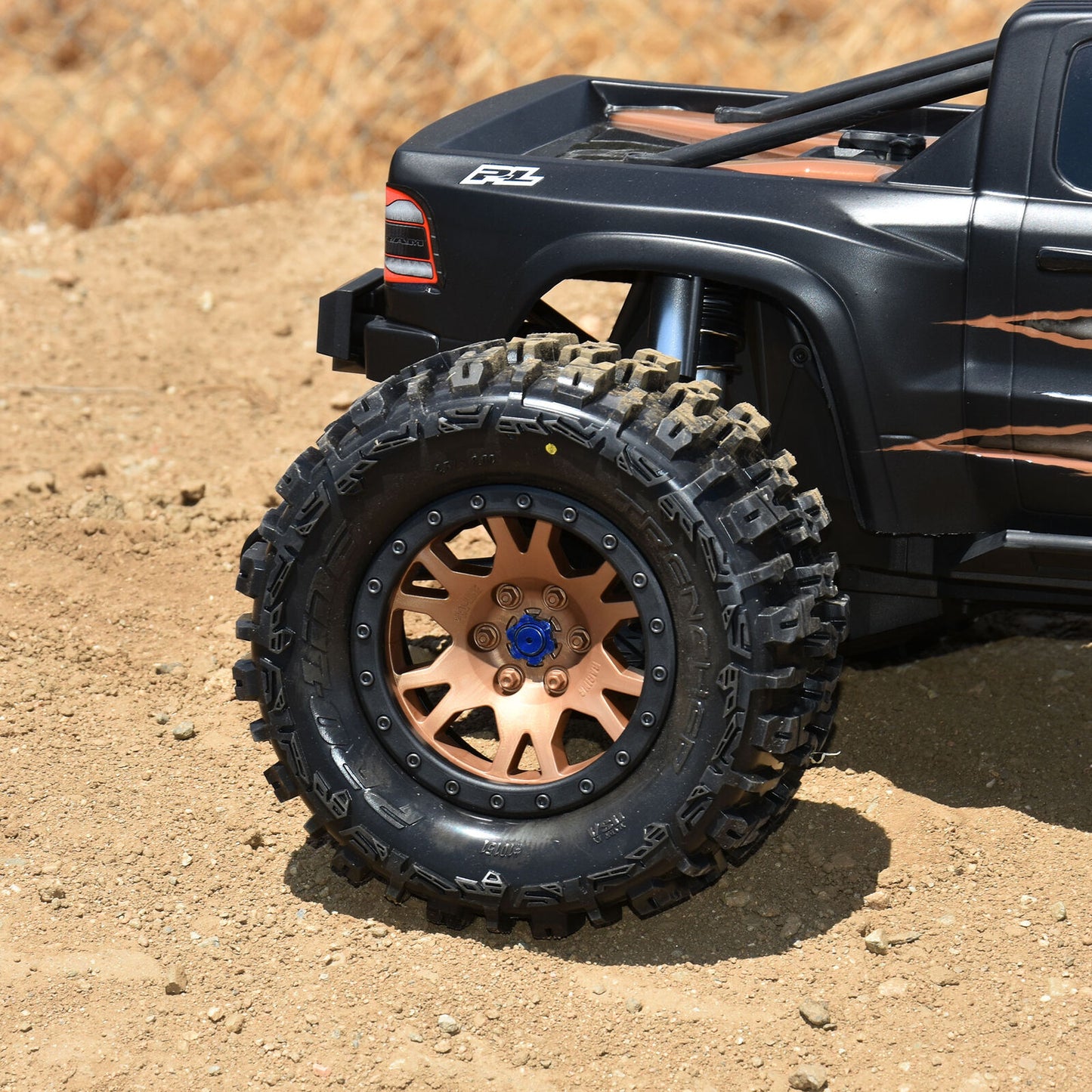 Limited Edition Trencher Pro-Loc F/R Mounted 24mm Bronze/Black Impulse (2) for X-Maxx