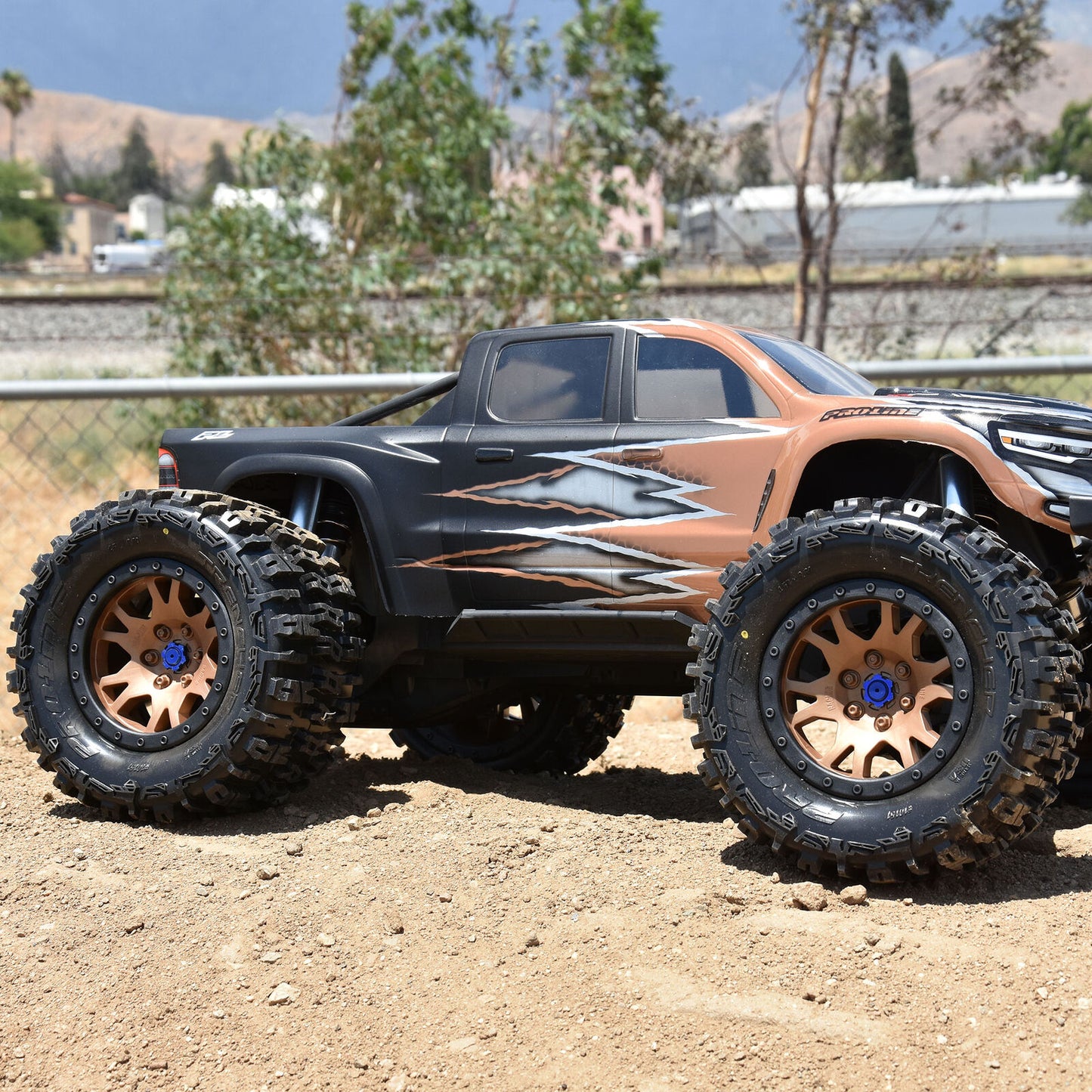 Limited Edition Trencher Pro-Loc F/R Mounted 24mm Bronze/Black Impulse (2) for X-Maxx